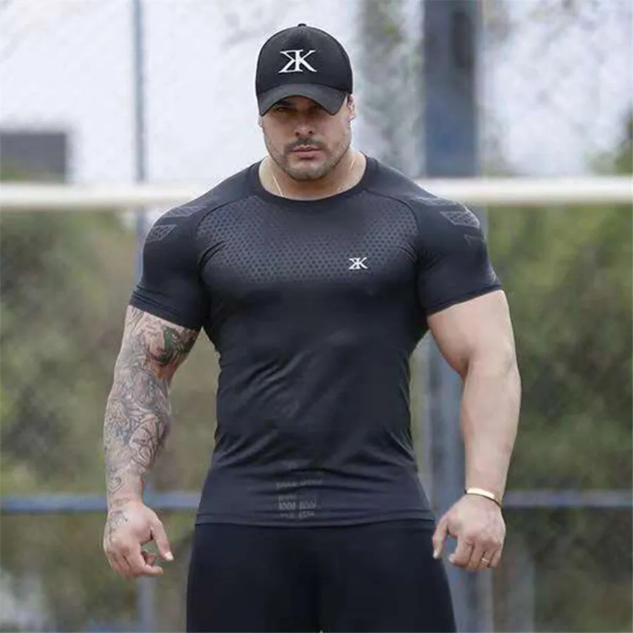 Jinquedai  Compression Quick dry T-shirt Men Running Sport Skinny Short Tee Shirt Male Gym Fitness Bodybuilding Workout Black Tops Clothing